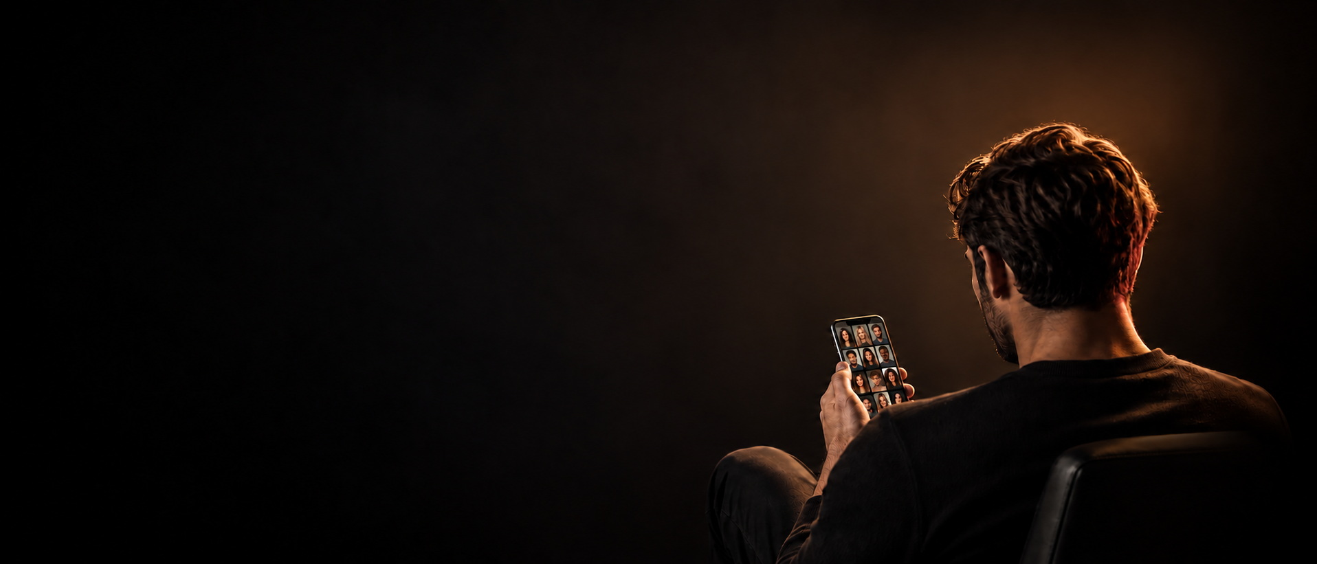 A man viewing creator profiles on a phone